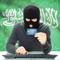 Concept of cybercrime with national flag on background - Saudi A