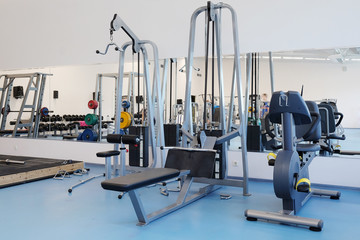 Obraz premium Interior of a fitness hall with fitness equipment