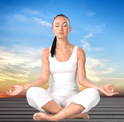 Fototapeta na wymiar Yoga Meditating.