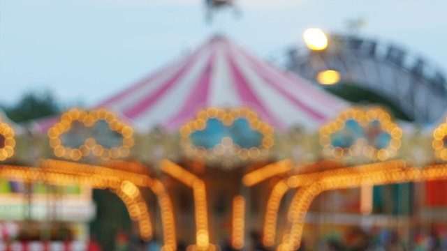Blur or defocus Fun fair or Amusement park.
