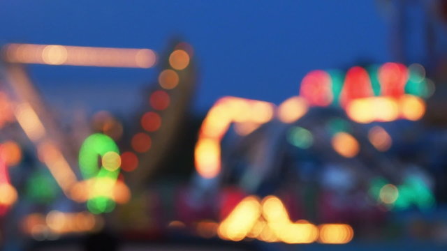 Blur or defocus Fun fair or Amusement park.
