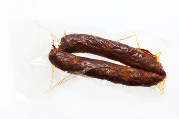 Spanish Chorizo or Portuguese chouriço is pork sausages with dr
