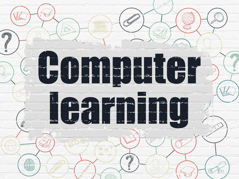 Studying concept: Computer Learning on wall background