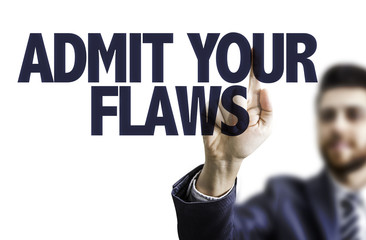 Business man pointing the text: Admit Your Flaws