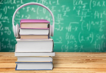 Headphones on Books.