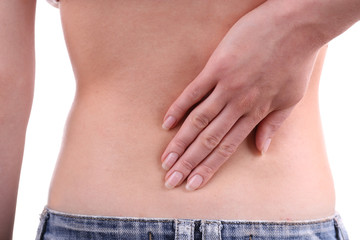 Fototapeta premium Young girl with back pain close up