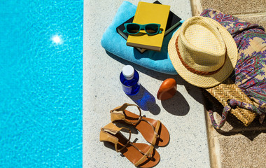 Relaxing in the swimming pool on summer.