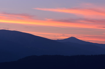 Silhouette of mountains at sunrise