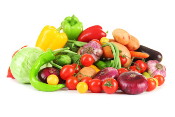 Fototapeta na wymiar Heap of fresh vegetables isolated on white