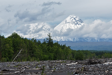Klyuchevskoy and Kamen Volcano on a cloudy day. Kamchatka