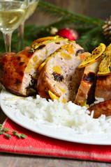 Grilled chicken stuffed with dried fruits in honey and orange gl