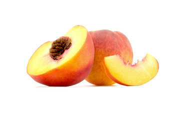 Peach sliced whole peach close-up isolated on white background