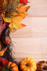 Fall decoration with seasonal leaves and fruits
