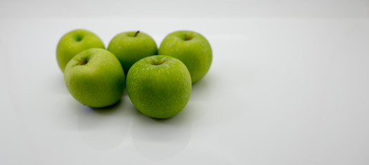 five small green apple