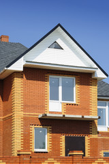 Modern brick building under construction
