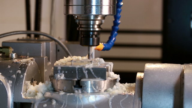 View close-up on running milling machine