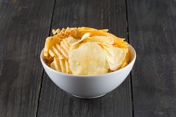 potato chips on wood background