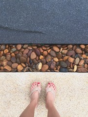 standing on poolside