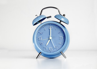 Blue analog retro twin bell alarm clock
