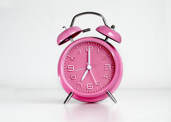 Pink analog retro twin bell alarm clock