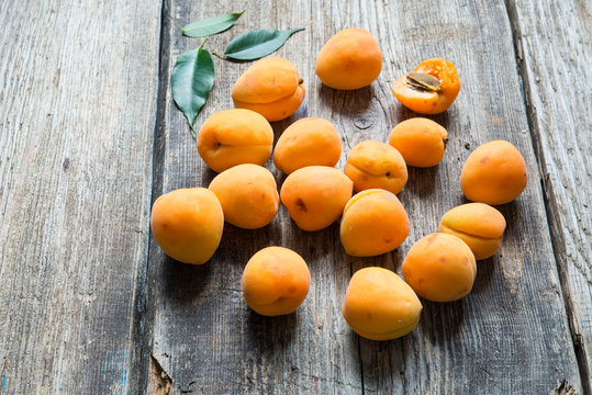 Apricot on a vintage wooden background