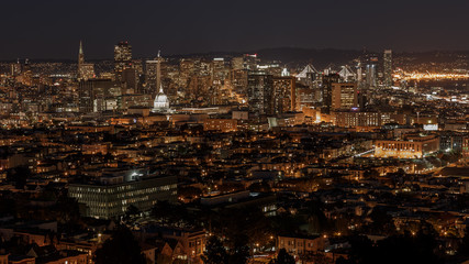 San Francisco skyline and bay bridge at night