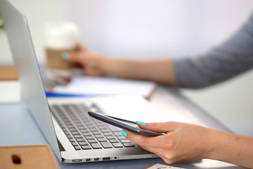 Young businesswoman working on a laptop