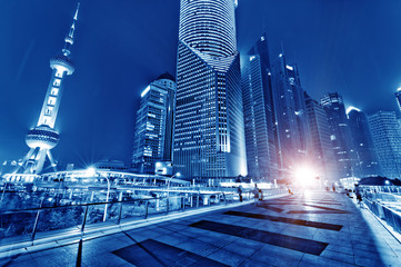 the light trails on the modern building background in shanghai china