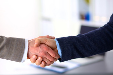 Business handshake. Two businessman shaking hands with each