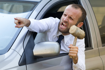 Stressed and angry driver in his car