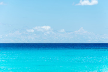 blue sky and water of ocean