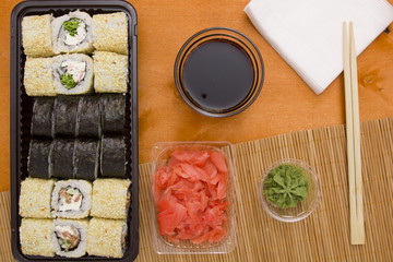 Fototapeta na wymiar Set of sushi and rolls