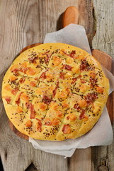 Delicious freshly baked traditional Italian focaccia bread with ham