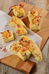 Delicious freshly baked traditional Italian focaccia bread with ham