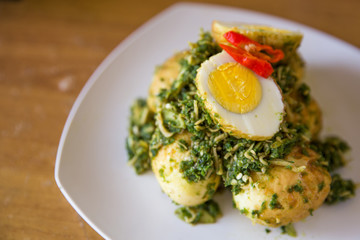 Stir-fry egg and green chili sauce mix with anchovy