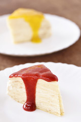 Crape cake with strawberry and lemon syrup