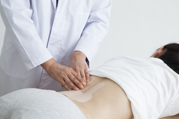 Obraz na płótnie Canvas Manipulative nurses have an inspection of low back pain