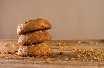 Oatmeal cookies with wooden background.