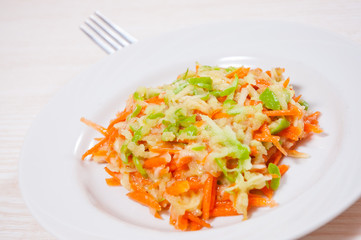 Fruit salad with carrots, apples, bananas