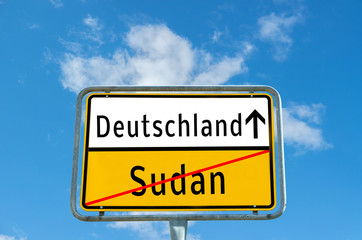 Obraz premium Ortstafel Deutschland/Sudan