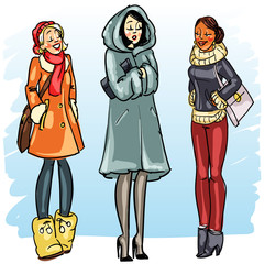 Happy women in winter clothing.
