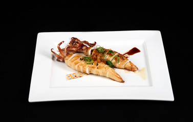 grilled squid with decoration of vegetables