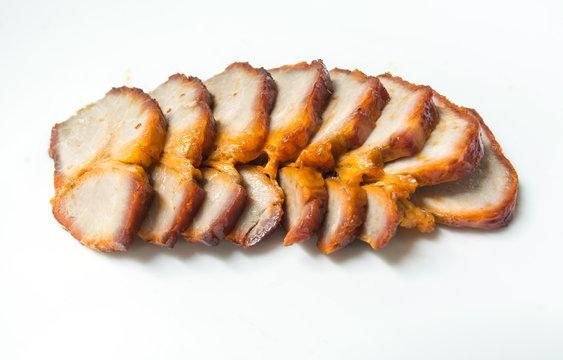 Sliced Roasted pork on white tone background