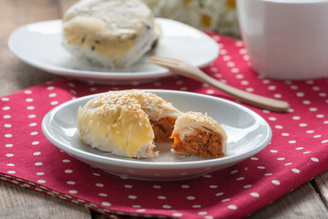 Roasted Pork pie on white dish..