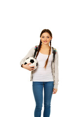 Young woman with foot ball.