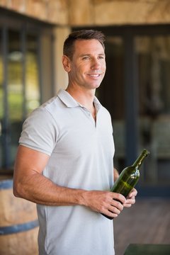 A man tasting wine