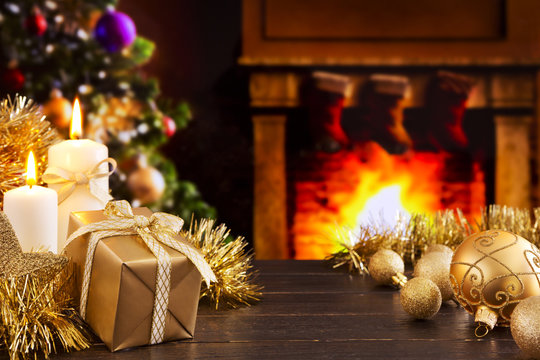 Christmas scene with a fireplace and Christmas tree