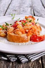 Bruschetta with vegetables and beans