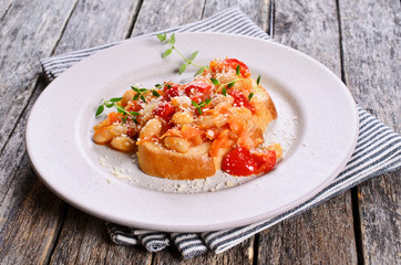 Bruschetta with vegetables and beans