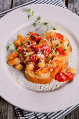 Bruschetta with vegetables and beans